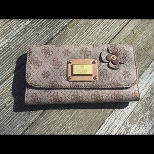GUESS wallet clutch with signature flower detail